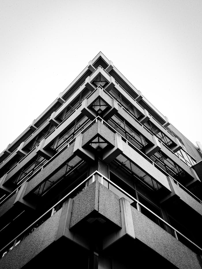 Black and white view of a geometric apartment facade in Zwolle, Netherlands.